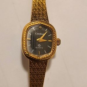 Ladies Cardinal diamond gold watch